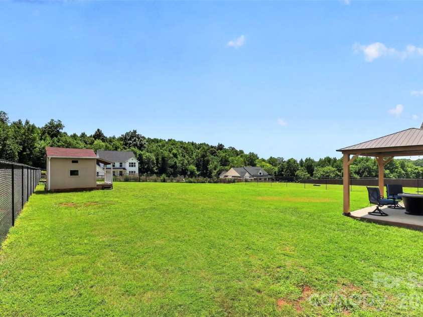 3889 Ritchie Road, Lincolnton, NC 28092.  MLS# CAR4408907, YatesRealty ID 41394. Open flat fenced in yard