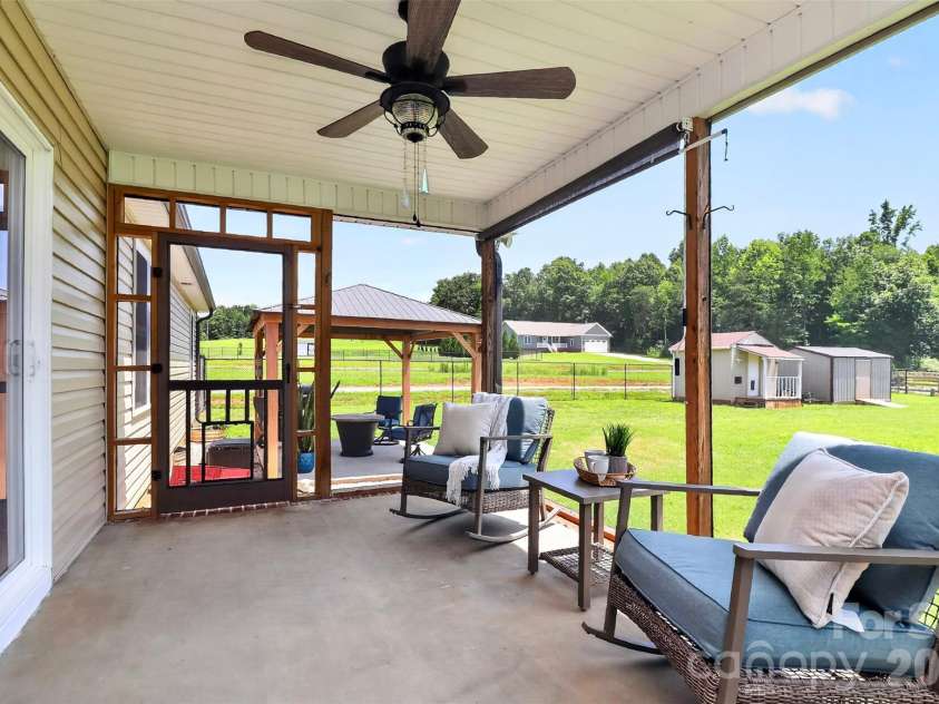 3889 Ritchie Road, Lincolnton, NC 28092.  MLS# CAR4408907, YatesRealty ID 41394. Screened in back porch