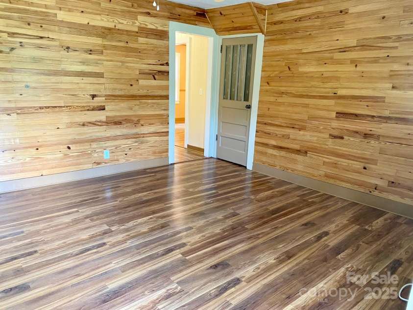 1294 Cane Creek Road, Bakersville, NC 28705.  MLS# CAR4291675, YatesRealty ID 414. Beautiful custom features include wood walls using wood from the late 1800's.