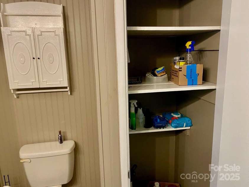 1294 Cane Creek Road, Bakersville, NC 28705.  MLS# CAR4291675, YatesRealty ID 414. Convenient linen closet with room for your cleaning supplies.