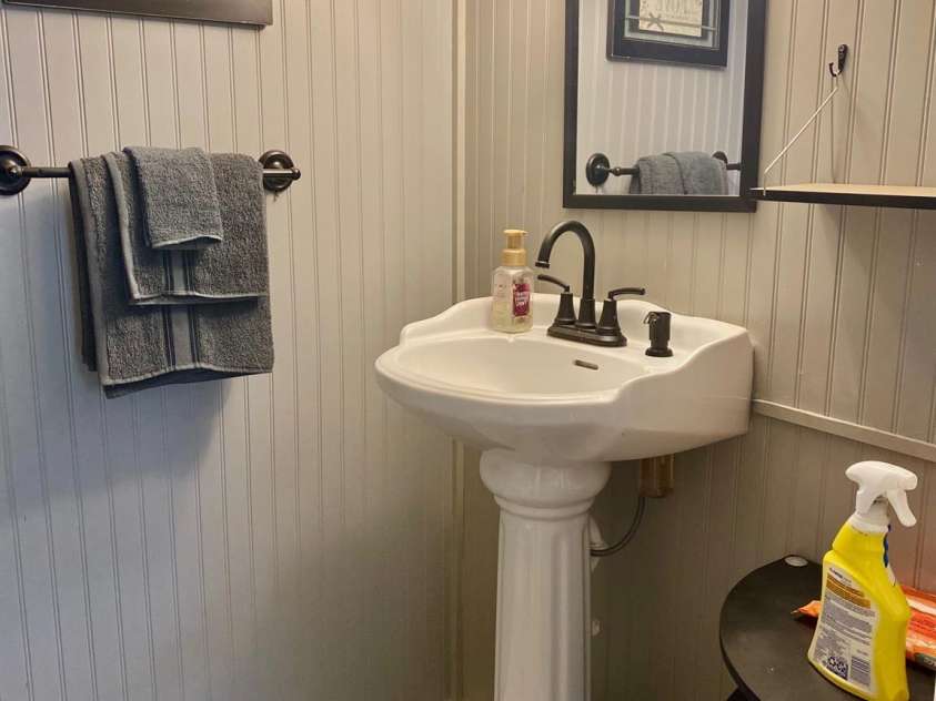 1294 Cane Creek Road, Bakersville, NC 28705.  MLS# CAR4291675, YatesRealty ID 414. Nice pedestal sink.