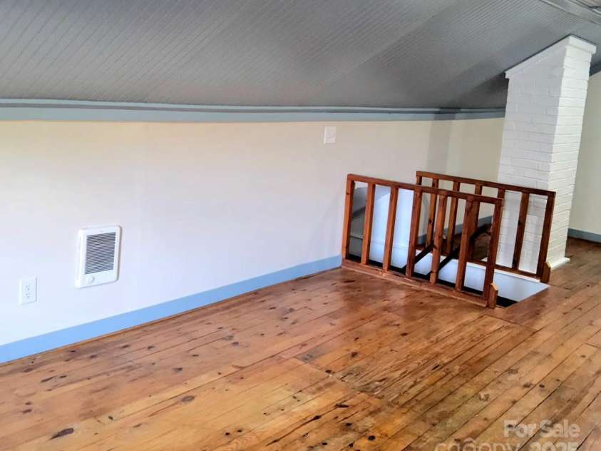 1294 Cane Creek Road, Bakersville, NC 28705.  MLS# CAR4291675, YatesRealty ID 414. Spacious attic is great space for an office or work out room.