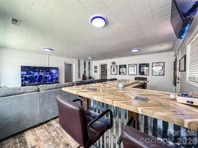 402 Wilton Avenue, West Jefferson, NC 28694.  MLS# CAR4411426, YatesRealty ID 41401. Game room