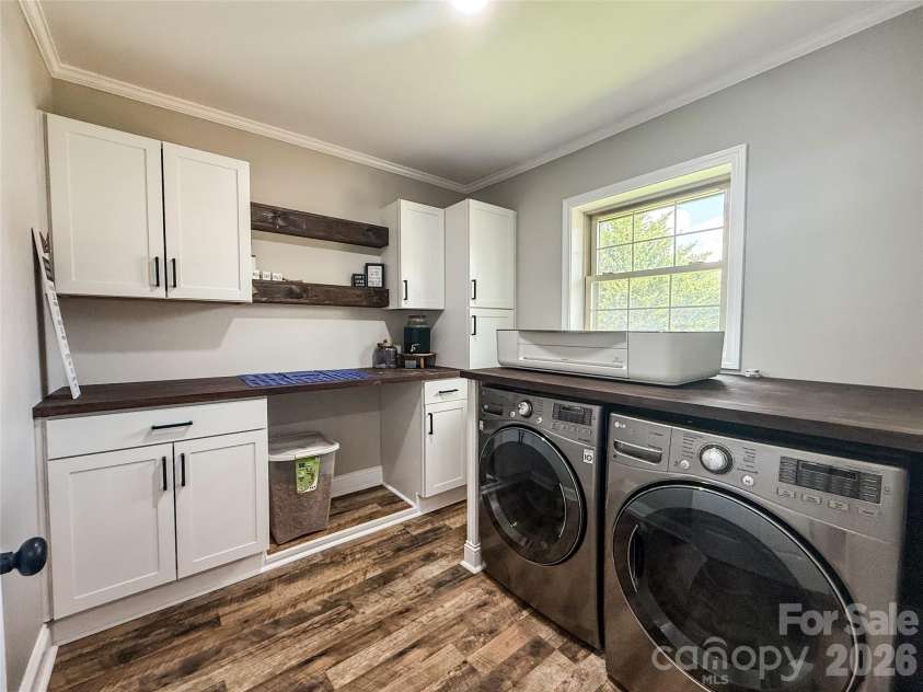 402 Wilton Avenue, West Jefferson, NC 28694.  MLS# CAR4411426, YatesRealty ID 41401. Laundry room