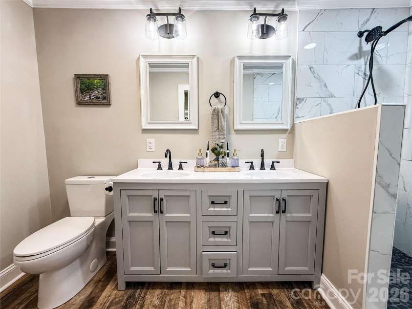 402 Wilton Avenue, West Jefferson, NC 28694.  MLS# CAR4411426, YatesRealty ID 41401. Master bathroom