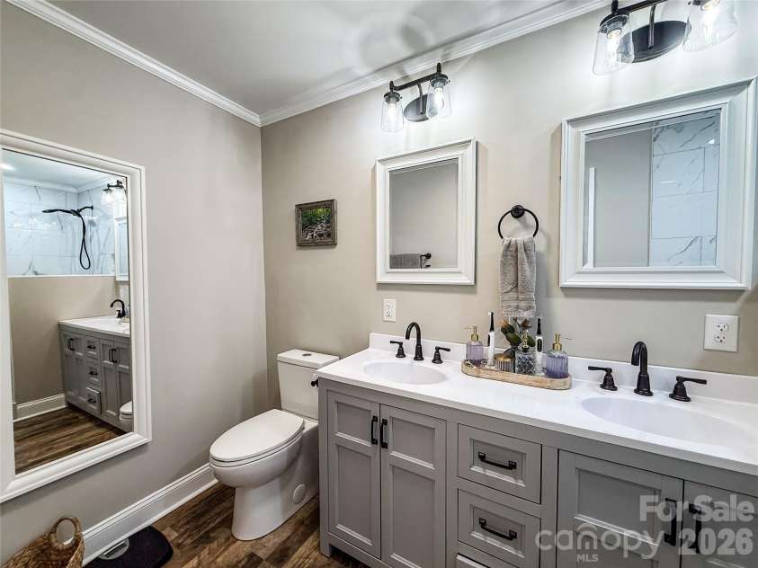402 Wilton Avenue, West Jefferson, NC 28694.  MLS# CAR4411426, YatesRealty ID 41401. Master bathroom