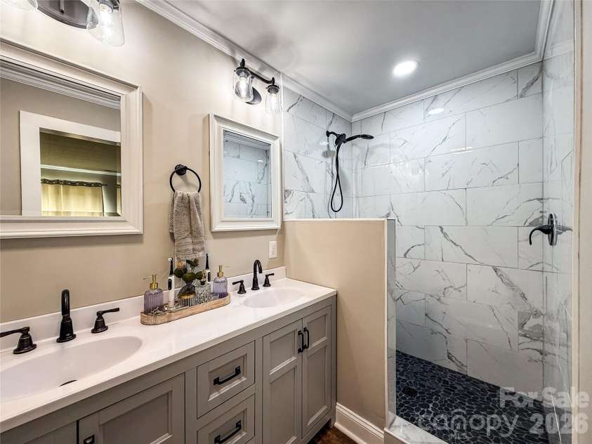402 Wilton Avenue, West Jefferson, NC 28694.  MLS# CAR4411426, YatesRealty ID 41401. Master bathroom