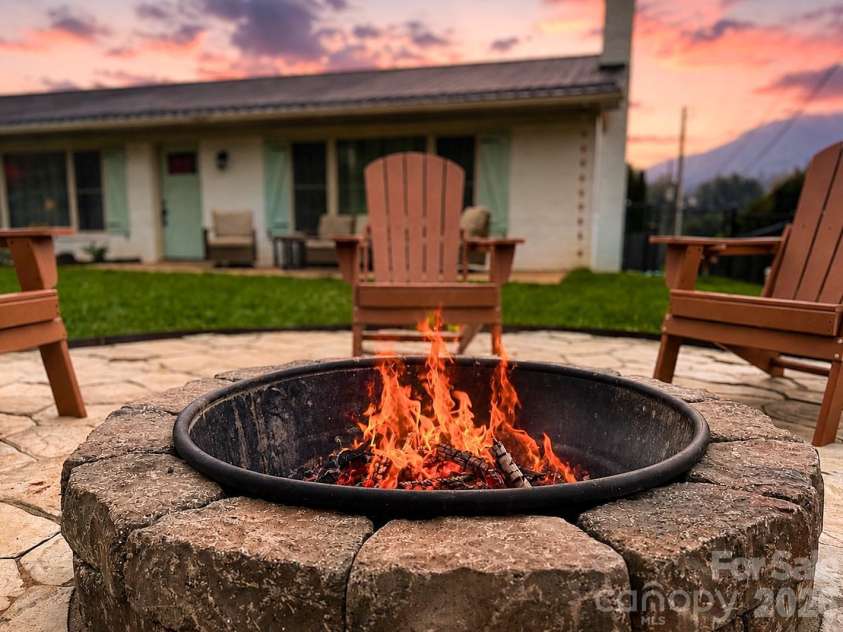 402 Wilton Avenue, West Jefferson, NC 28694.  MLS# CAR4411426, YatesRealty ID 41401. View of Mt. Jefferson from the firepit