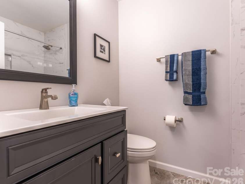 5203 Spring Morning Lane, Monroe, NC 28110.  MLS# CAR4405485, YatesRealty ID 41404. Hallway Bathroom