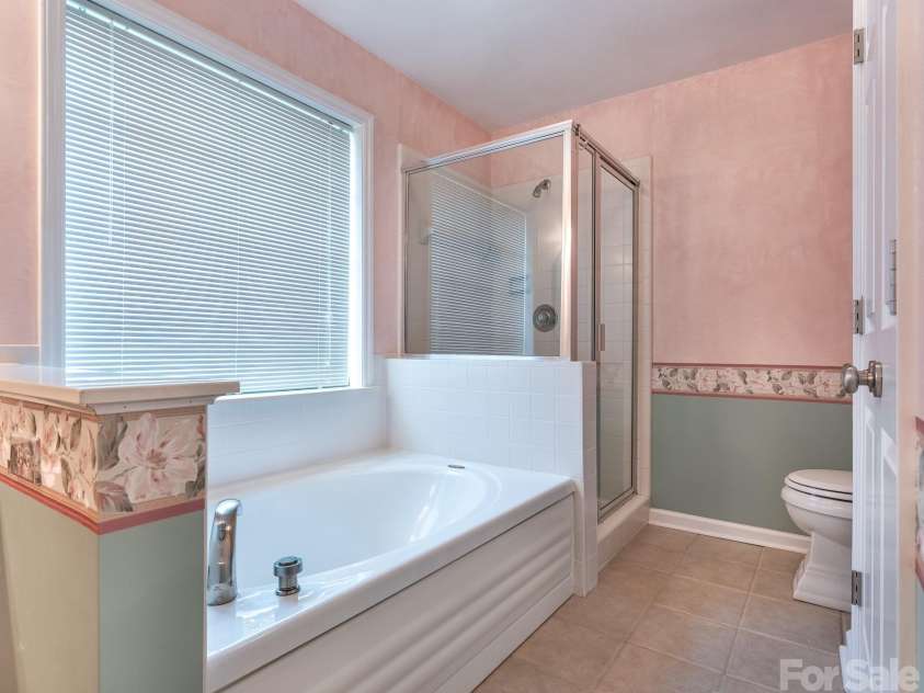 5203 Spring Morning Lane, Monroe, NC 28110.  MLS# CAR4405485, YatesRealty ID 41404. Primary Bathroom