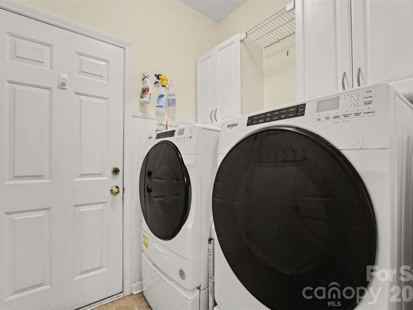 21315 Harken Drive, Cornelius, NC 28031.  MLS# CAR4409603, YatesRealty ID 41413. Downstairs Laundry