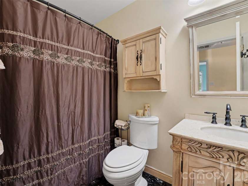 21315 Harken Drive, Cornelius, NC 28031.  MLS# CAR4409603, YatesRealty ID 41413. Full Bathroom