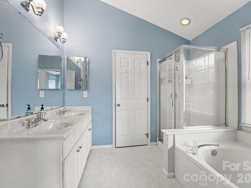 21315 Harken Drive, Cornelius, NC 28031.  MLS# CAR4409603, YatesRealty ID 41413. Primary Bathroom