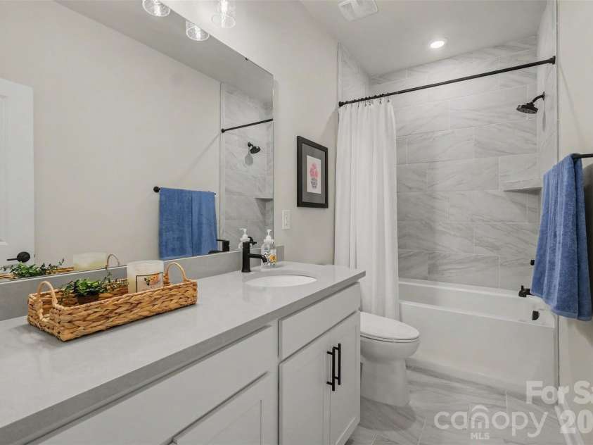 4128 Merkland Lane, Charlotte, NC 28226.  MLS# CAR4409085, YatesRealty ID 41414. Guest bathroom