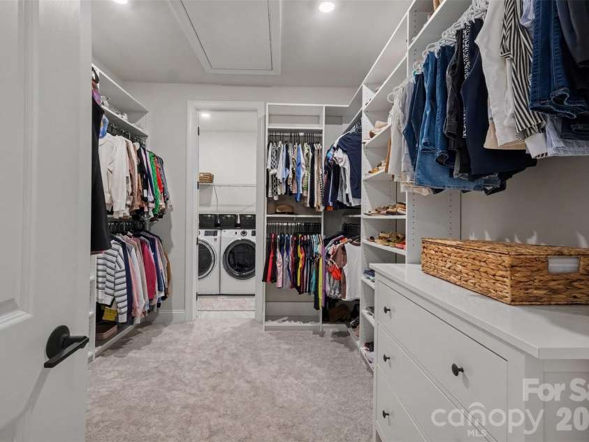 4128 Merkland Lane, Charlotte, NC 28226.  MLS# CAR4409085, YatesRealty ID 41414. Primary closet with custom storage system