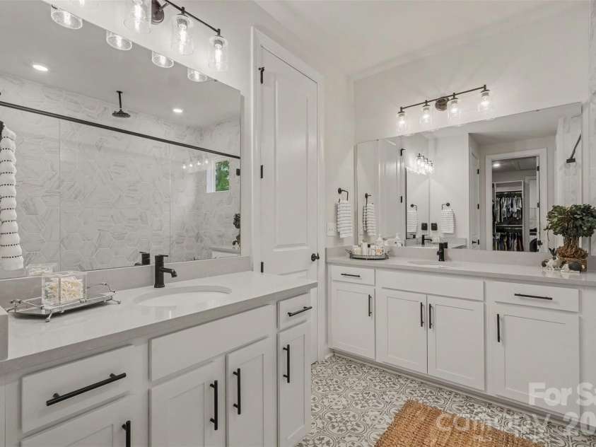 4128 Merkland Lane, Charlotte, NC 28226.  MLS# CAR4409085, YatesRealty ID 41414. Primary with separate vanities