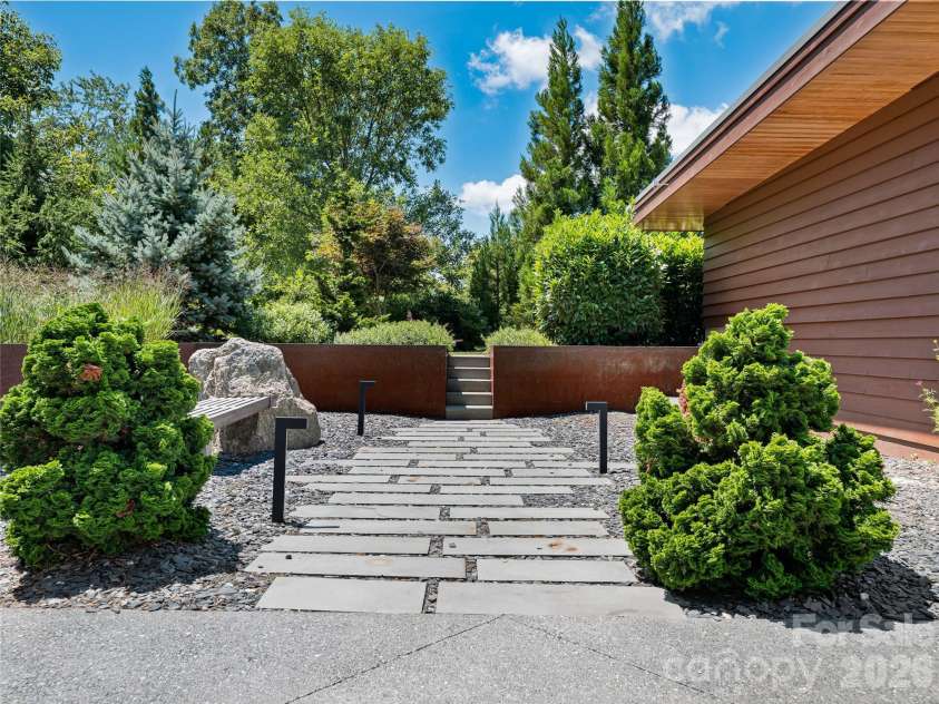 25 Bartrams Walk Drive, Asheville, NC 28804.  MLS# CAR4402146, YatesRealty ID 41418. Beautiful mature landscaping