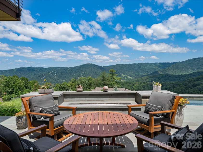 25 Bartrams Walk Drive, Asheville, NC 28804.  MLS# CAR4402146, YatesRealty ID 41418. Built-in gas fireplace for cool evenings
