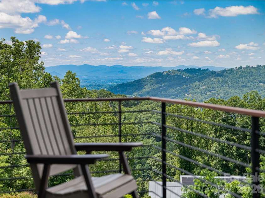 25 Bartrams Walk Drive, Asheville, NC 28804.  MLS# CAR4402146, YatesRealty ID 41418. Open the sliding door to the upper balcony