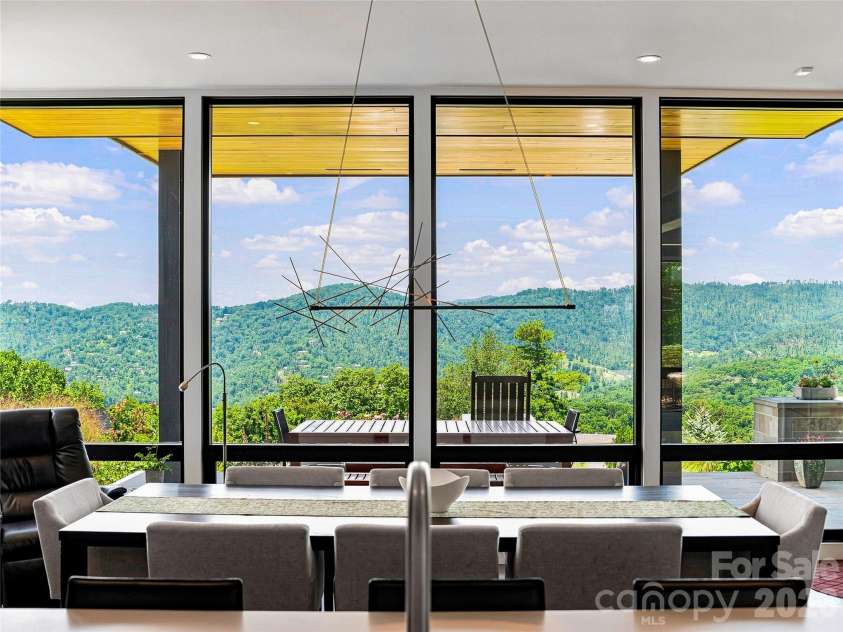25 Bartrams Walk Drive, Asheville, NC 28804.  MLS# CAR4402146, YatesRealty ID 41418. Stunning views from the dining room table