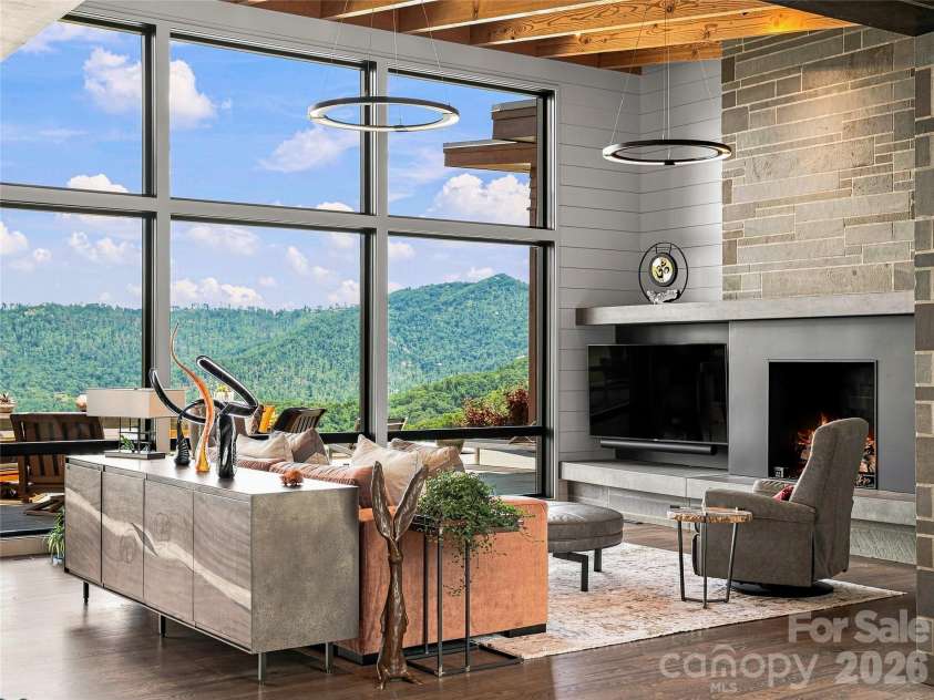 25 Bartrams Walk Drive, Asheville, NC 28804.  MLS# CAR4402146, YatesRealty ID 41418. The floor to ceilling windows frame the gorgeous mountain scape.