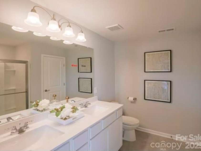 12028 Grinstead Lane, Charlotte, NC 28278.  MLS# CAR4215992, YatesRealty ID 4143. Representative only, Primary bathroom