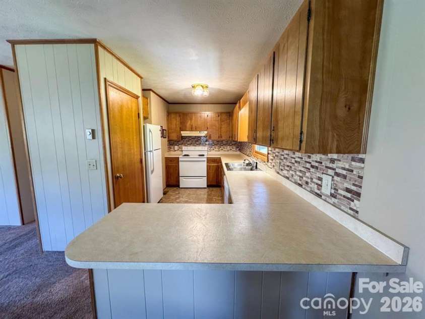 84 Stoney Ridge Loop, Maggie Valley, NC 28751.  MLS# CAR4405541, YatesRealty ID 41458. 