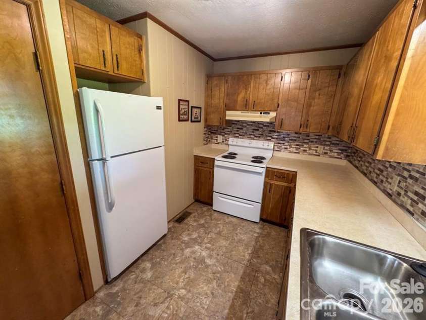 84 Stoney Ridge Loop, Maggie Valley, NC 28751.  MLS# CAR4405541, YatesRealty ID 41458. 