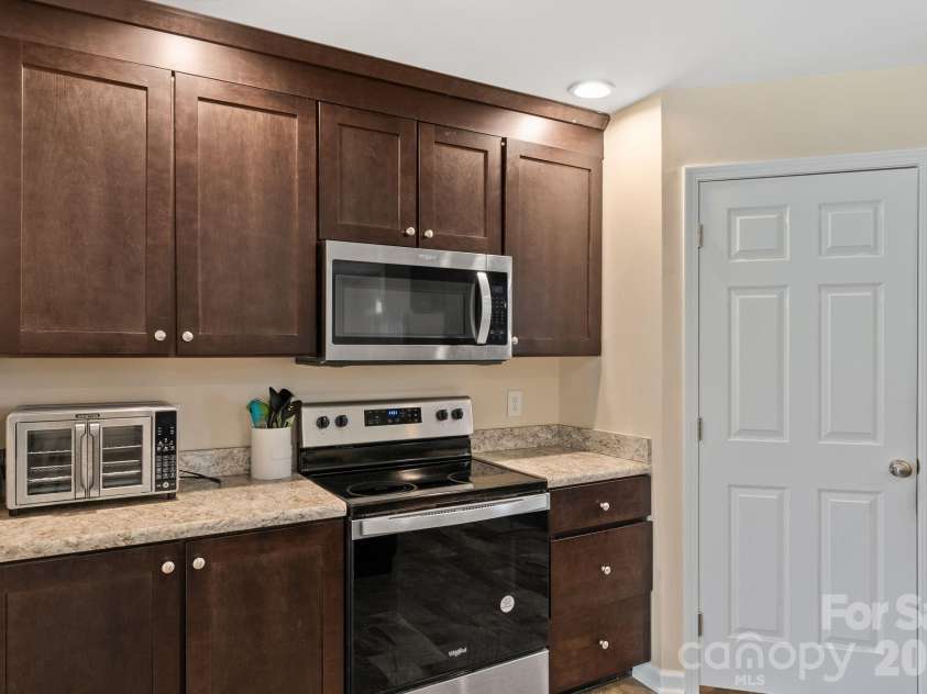 247-1 Bent Creek Ranch Road, Asheville, NC 28806.  MLS# CAR4356700, YatesRealty ID 4148. Kitchen with large pantry