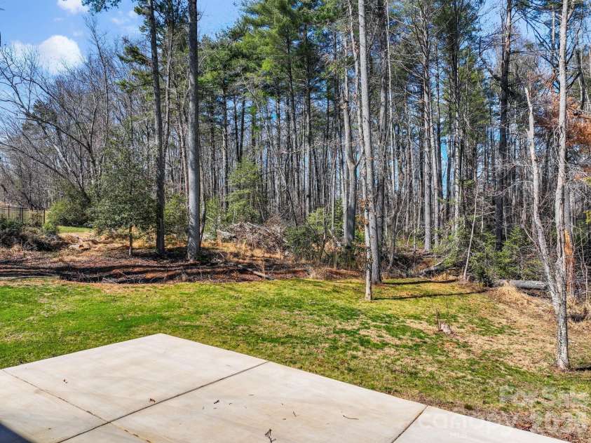 247-1 Bent Creek Ranch Road, Asheville, NC 28806.  MLS# CAR4356700, YatesRealty ID 4148. Wooded back view