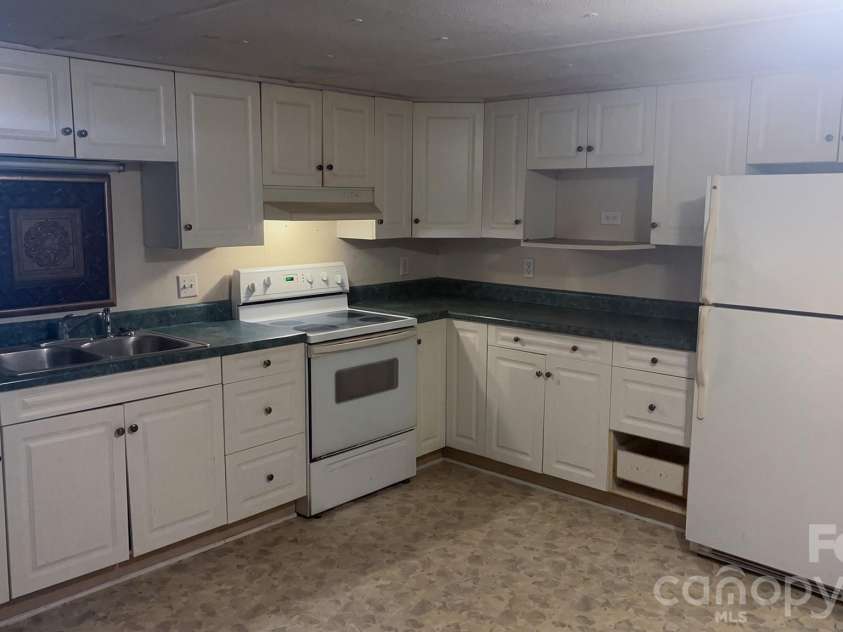 732 Sunset Lakes Boulevard, Sunset Beach, NC 28468.  MLS# CAR4411850, YatesRealty ID 41498. 