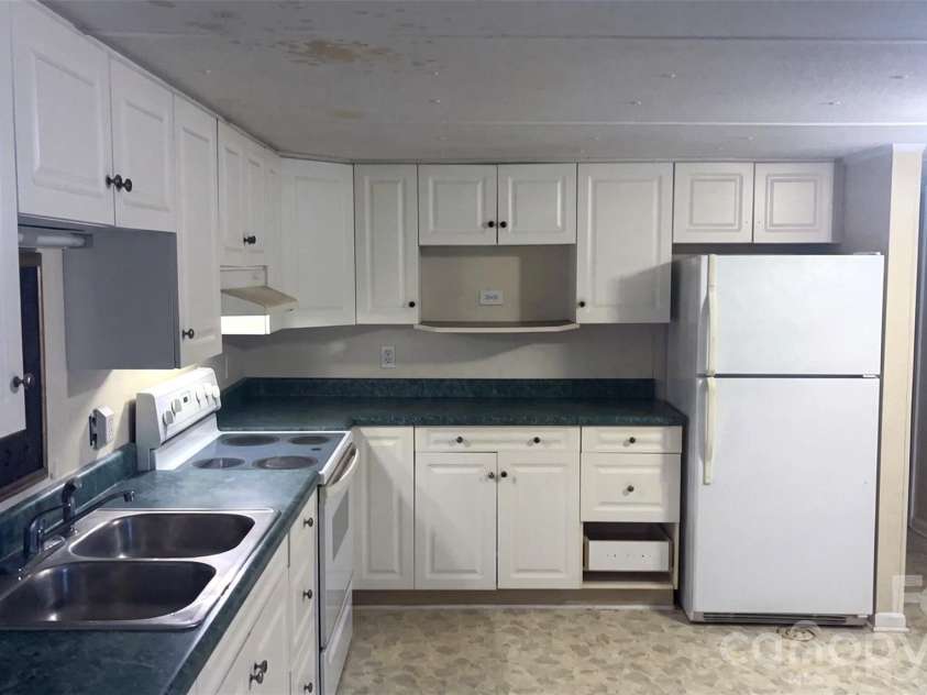 732 Sunset Lakes Boulevard, Sunset Beach, NC 28468.  MLS# CAR4411850, YatesRealty ID 41498. 