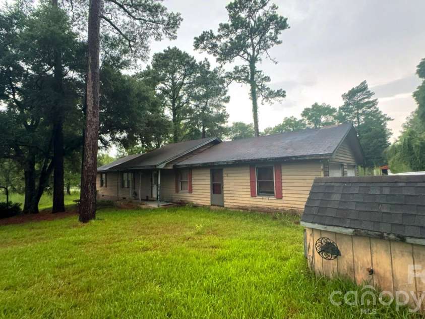 732 Sunset Lakes Boulevard, Sunset Beach, NC 28468.  MLS# CAR4411850, YatesRealty ID 41498. 