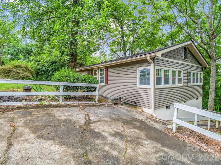 297 Chimney Cliffs Drive, Lake Lure, NC 28746.  MLS# CAR4408093, YatesRealty ID 41523. 