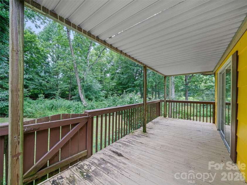 1644 State Hwy 80 S None, Burnsville, NC 28714.  MLS# CAR4408364, YatesRealty ID 41533. Side Covered Porch