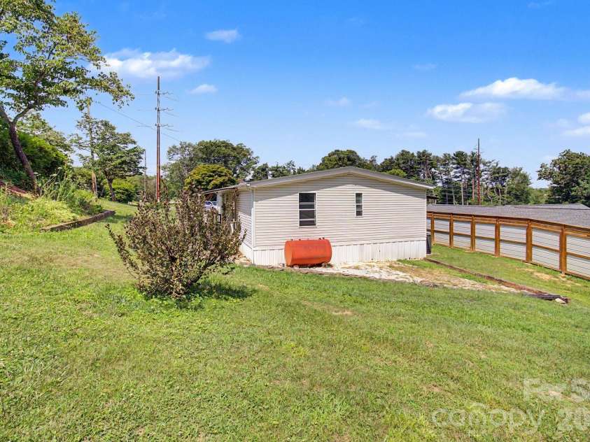 1011 Reed Street, Asheville, NC 28804.  MLS# CAR4396537, YatesRealty ID 41535. Back yard