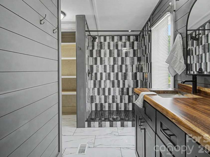 1011 Reed Street, Asheville, NC 28804.  MLS# CAR4396537, YatesRealty ID 41535. Primary bath