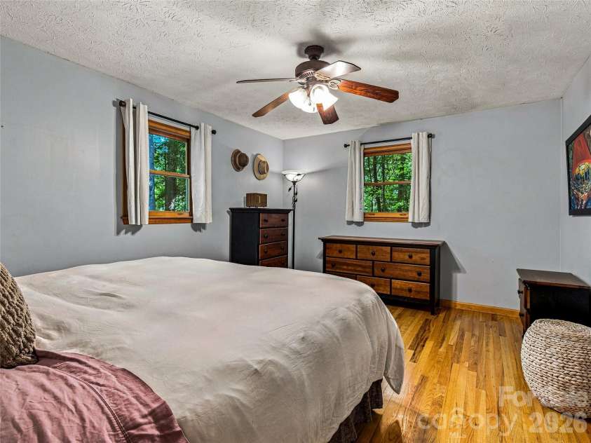 70 Promised Ridge Drive, Hendersonville, NC 28791.  MLS# CAR4411866, YatesRealty ID 41538. Primary bedroom