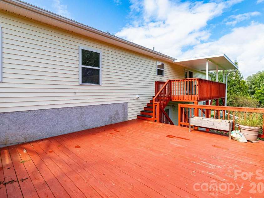 73 Ridge Brook Drive, Weaverville, NC 28787.  MLS# CAR4406346, YatesRealty ID 41544. Spacious back deck
