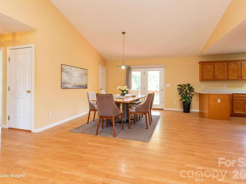 73 Ridge Brook Drive, Weaverville, NC 28787.  MLS# CAR4406346, YatesRealty ID 41544. Virtually staged dining area