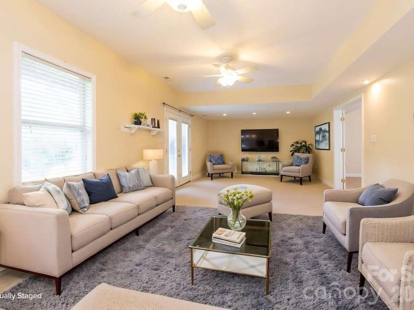 73 Ridge Brook Drive, Weaverville, NC 28787.  MLS# CAR4406346, YatesRealty ID 41544. Virtually staged lower level area