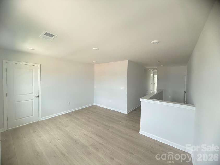 4013 Juno Drive, Charlotte, NC 28215.  MLS# CAR4407718, YatesRealty ID 41547. Loft on 2nd Floor w/ Walk-In Closet for Additional Storage