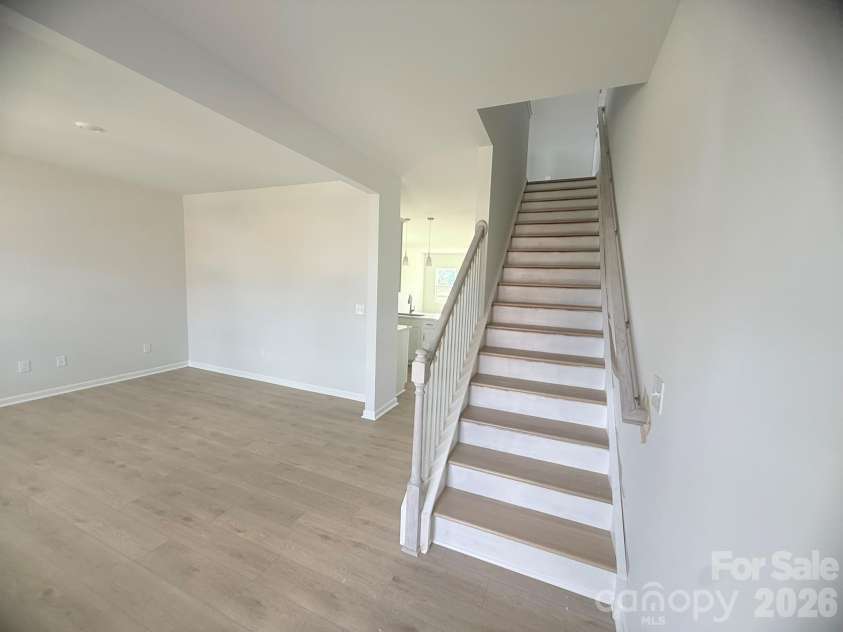 4013 Juno Drive, Charlotte, NC 28215.  MLS# CAR4407718, YatesRealty ID 41547. Stairs to 2nd Floor Feature Oak Tread