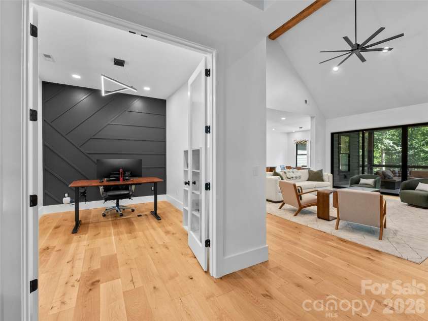 80 Maple Grove Court, Hendersonville, NC 28792.  MLS# CAR4409881, YatesRealty ID 41559. Beautiful separate flex space to be used as an office or creative studio...direct access to primary living space so you can be close.....but not too close : )