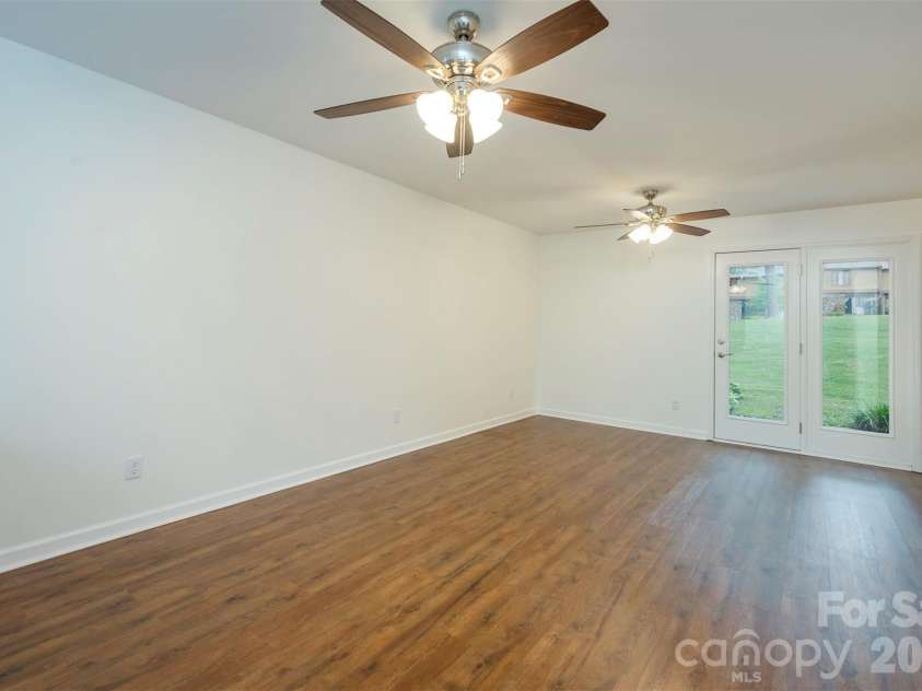 129 Colony Drive, Arden, NC 28704.  MLS# CAR4407138, YatesRealty ID 41561. Doors to patio