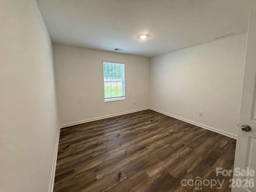 161 Spotted Way, Troutman, NC 28166.  MLS# CAR4406028, YatesRealty ID 41562. 1st floor guest suite
