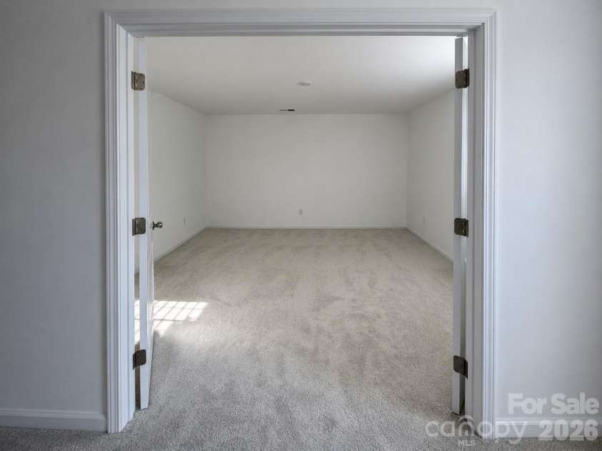 161 Spotted Way, Troutman, NC 28166.  MLS# CAR4406028, YatesRealty ID 41562. 2nd floor Bonus room with doors