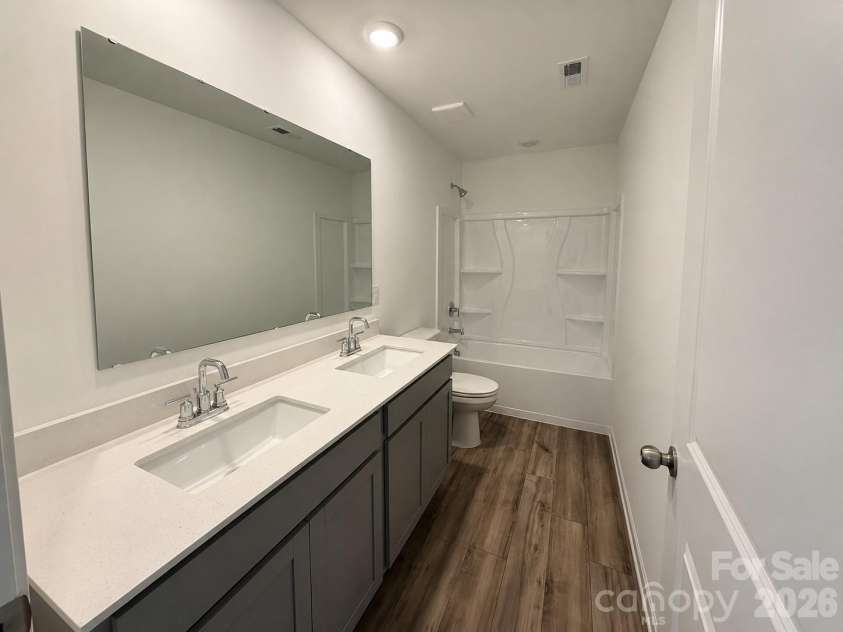 161 Spotted Way, Troutman, NC 28166.  MLS# CAR4406028, YatesRealty ID 41562. Beautiful bathroom with double vanity and undermount sink