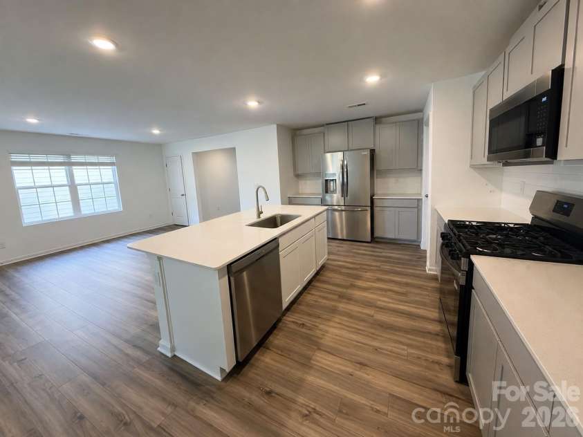 161 Spotted Way, Troutman, NC 28166.  MLS# CAR4406028, YatesRealty ID 41562. Chef's kitchen w stainless steel appliances