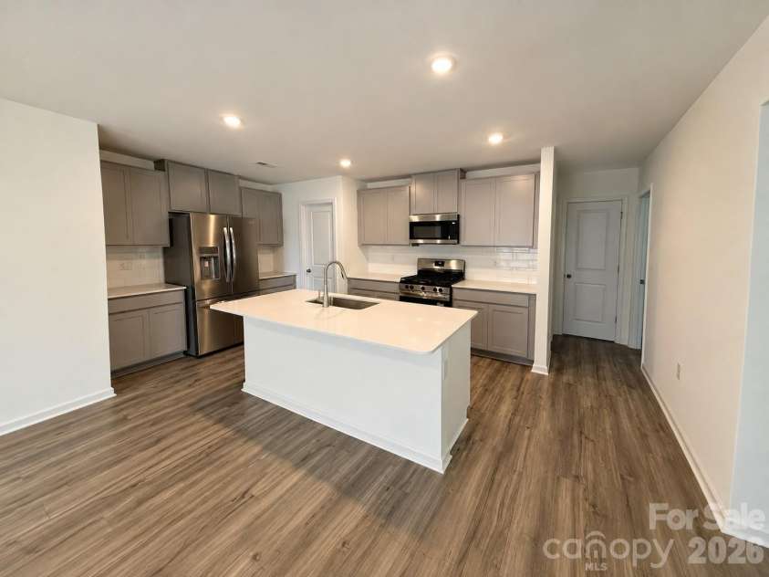 161 Spotted Way, Troutman, NC 28166.  MLS# CAR4406028, YatesRealty ID 41562. Island for entertaining